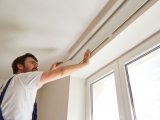 Cordless Blinds and Shades | Lake Forest Blinds & Shades CA A room bathed in natural light, featuring child and pet-friendly cordless blinds for enhanced safety.